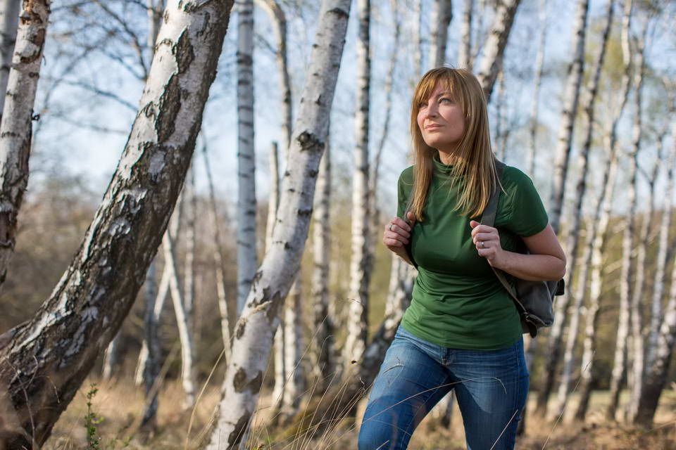 Natalia Schindler in a birch forest